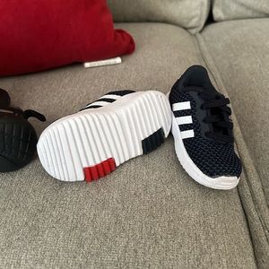 1 pair of black Nike sneakers, 1 pair of navy blue & white baby Adidas.